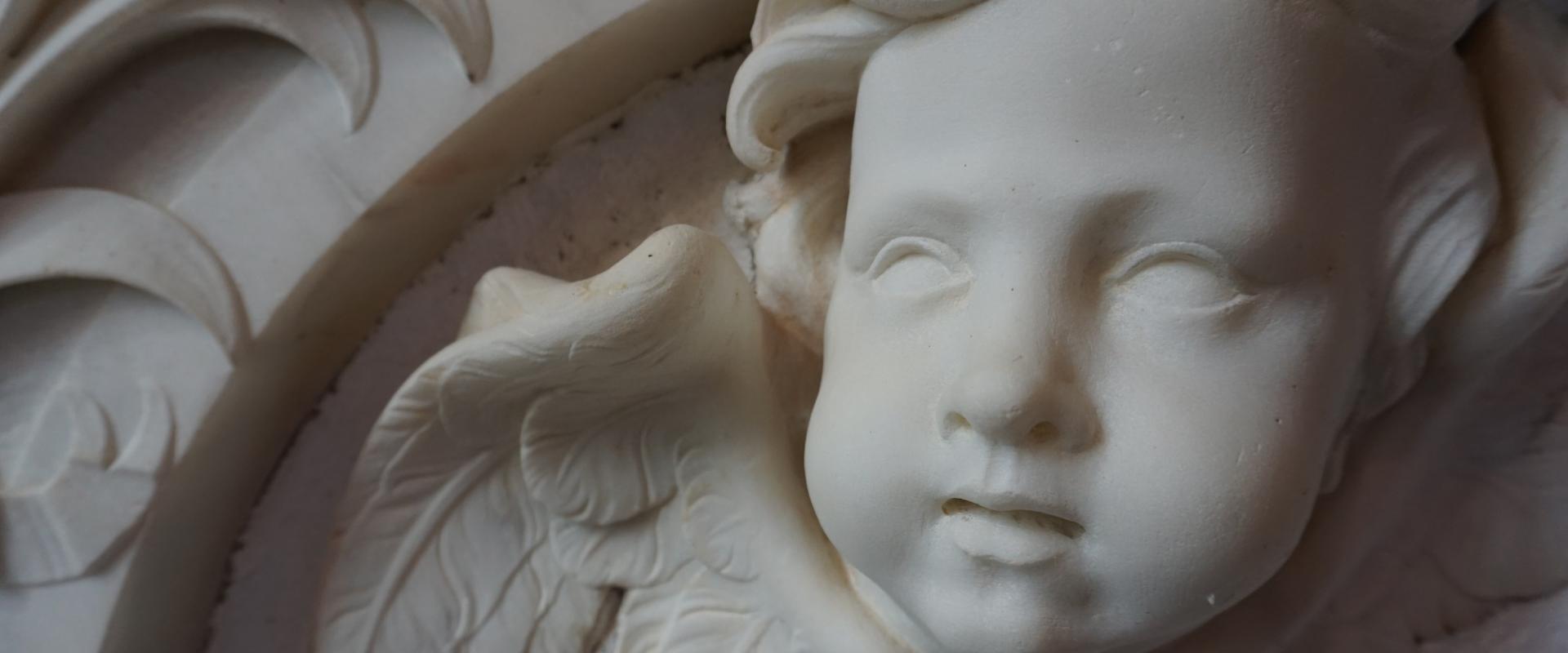 white moulding angel face