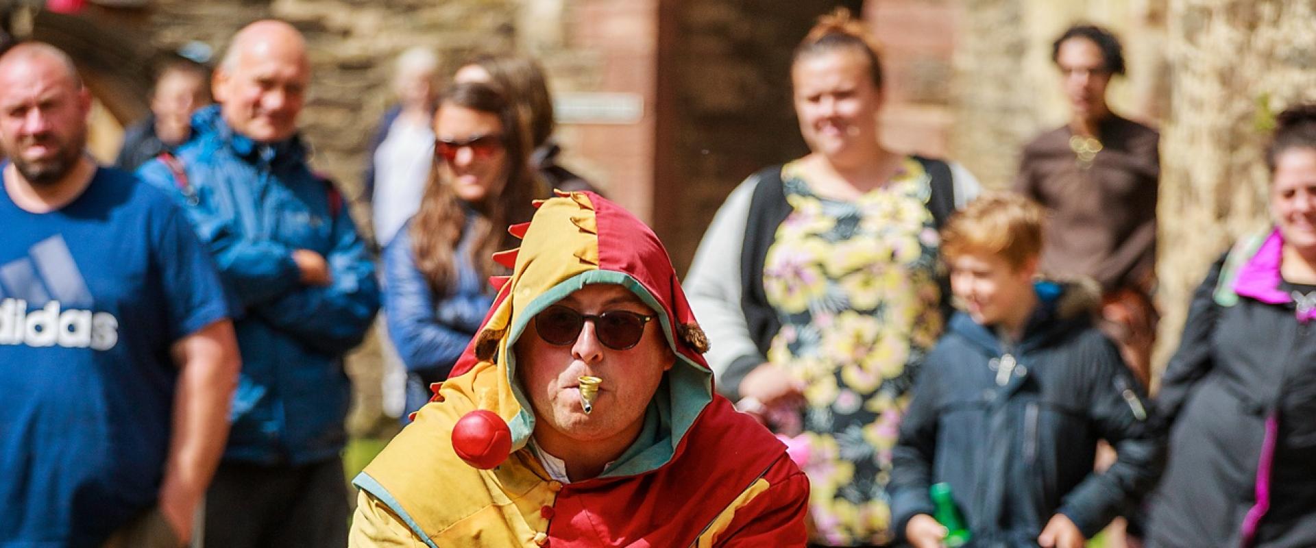 Conwy jester blowing a kazoo