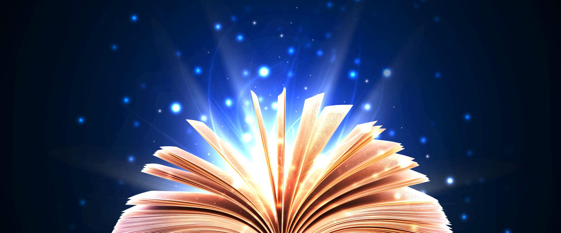 Open book with blue magic sparkles