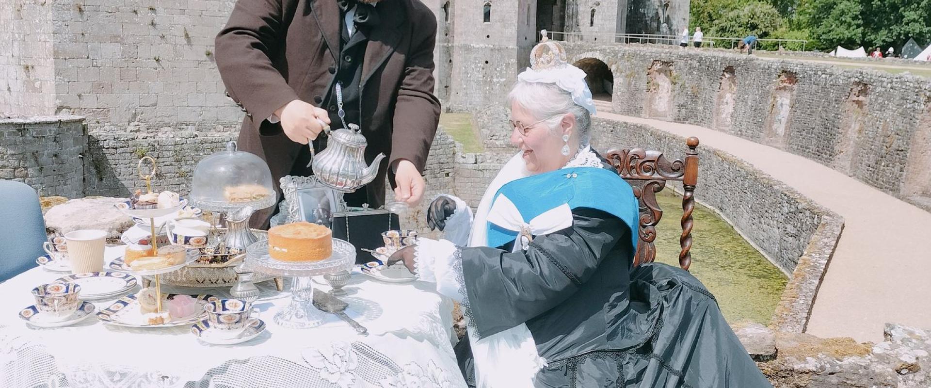 Queen Victoria enjoying a cup of tea