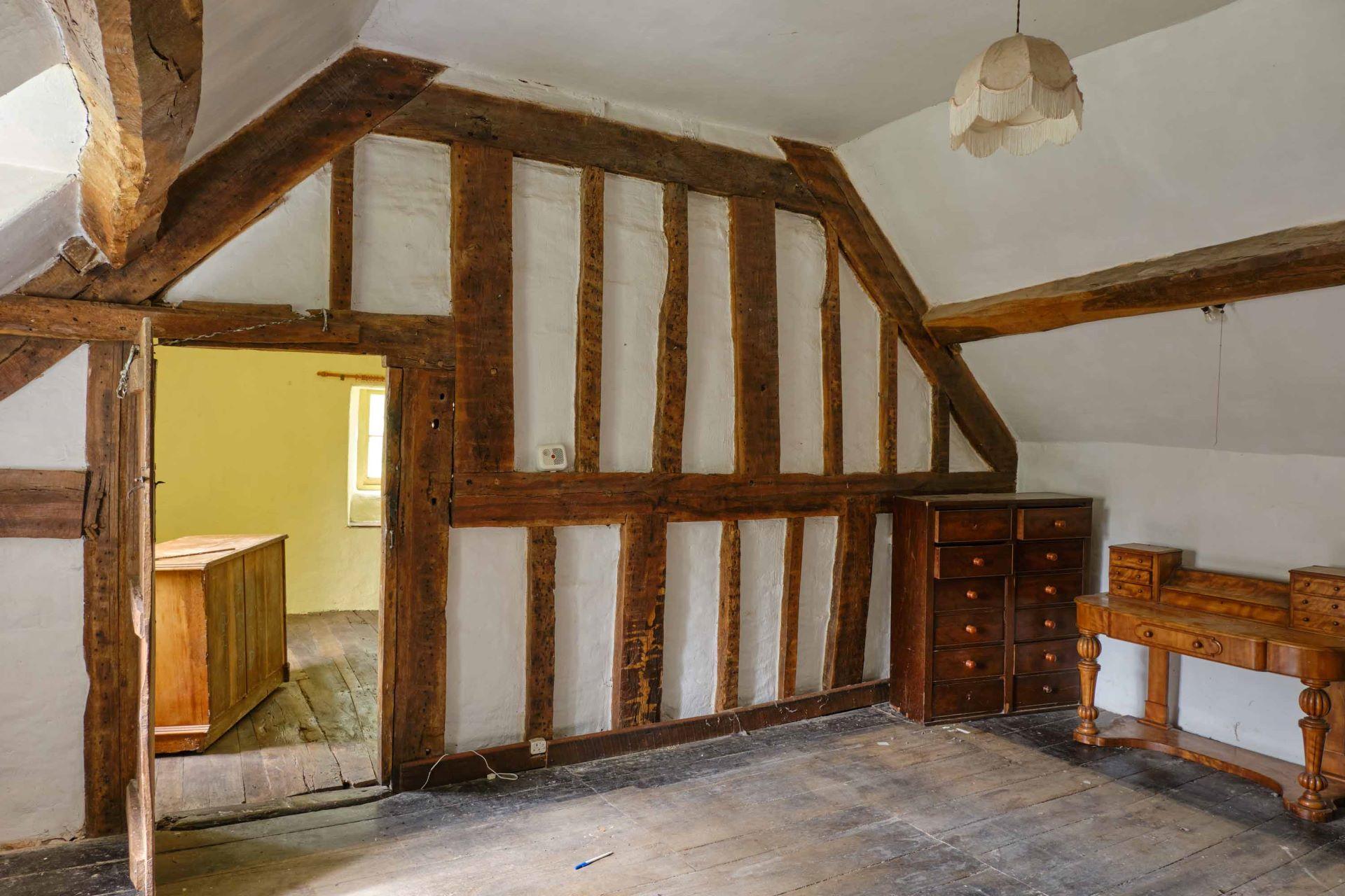 Listed building - Peny y Graig farmhouse - internal room showing timber beams