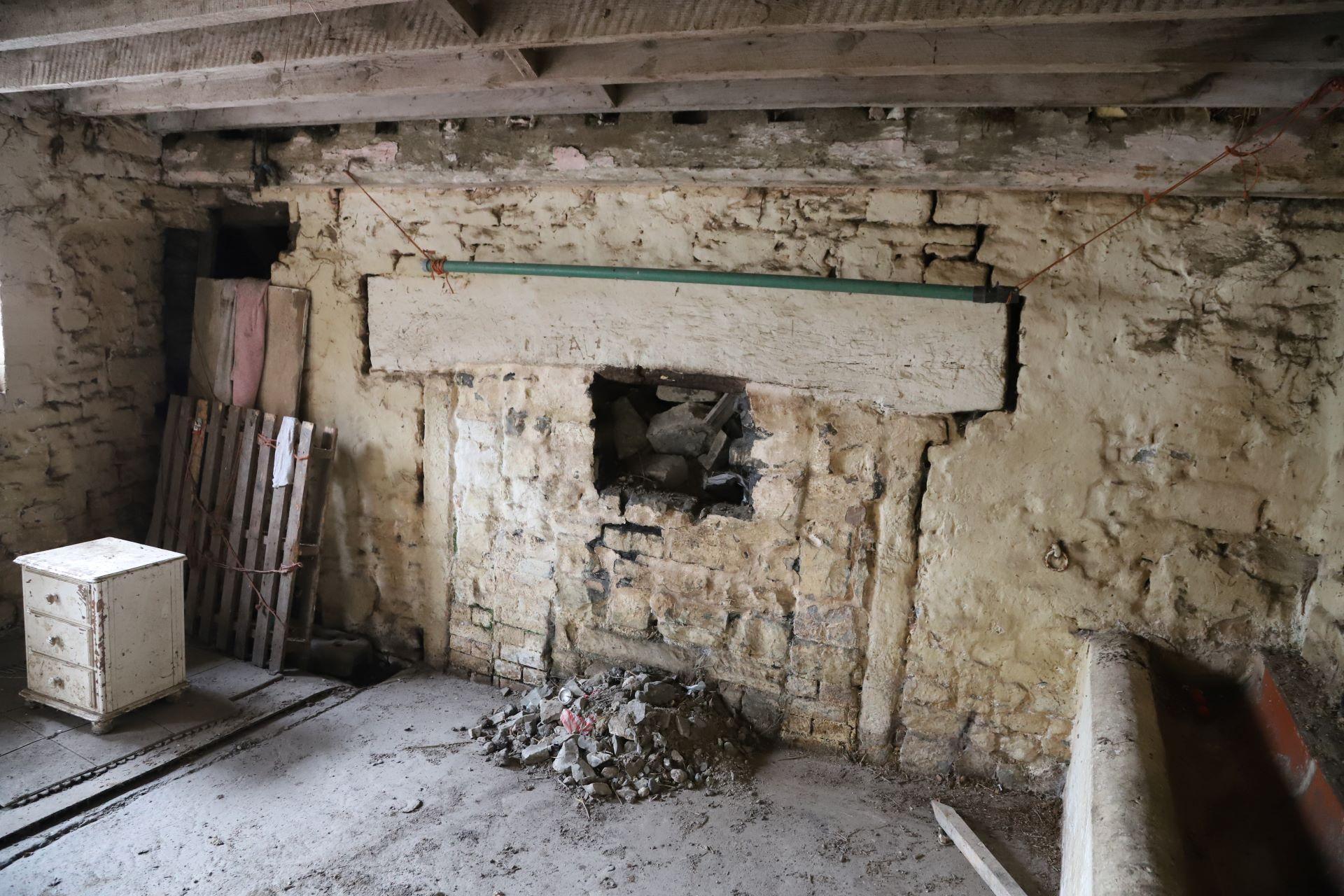 News - Lower Cosmeston Farmhouse - interior fireplace